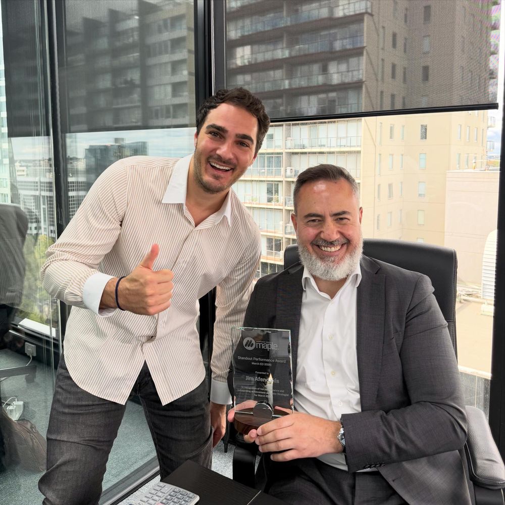 Beau with a Maple client at handover